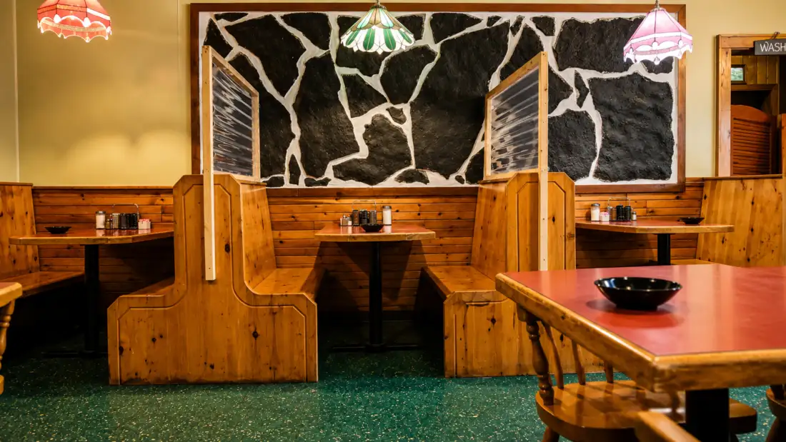 Wood booth seating at Top Notch Breakfast Restaurant