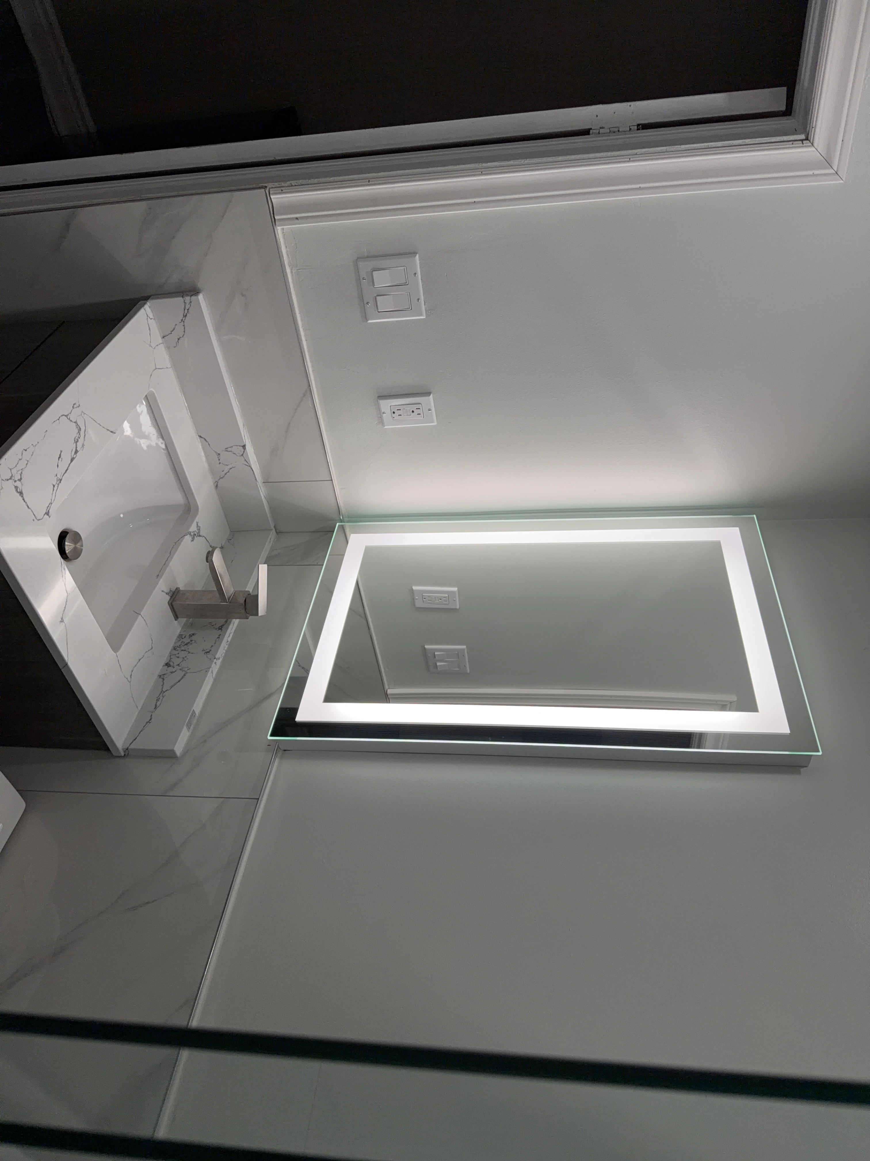 Bathroom vanity in the Single Queen Room